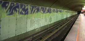 The damaged mural on the Côte-Vertu platform