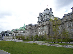 Champ de Mars park, with the foundations of the original fortifications, in front of City Hall (left) and the former Palais de Justice