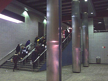 Stairs from the orange-line platforms to the mezzanine