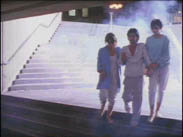 Mireille (Catherine Wilkening) and Constance (Johanne-Marie Tremblay) assist Daniel (Lothaire Bluteau) to walk in J&eacute;sus de Montr&eacute;al