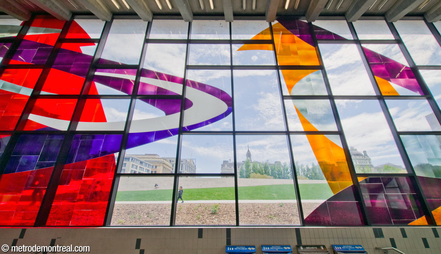 Part of the stained-glass window by Marcelle Ferron, on the south wall of the headhouse. The Place des Montréalaises and City Hall are visible through the window.