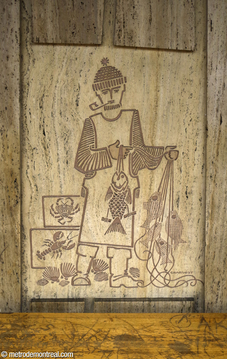 A bas-relief by Jean-Charles Charuest on one of the station's platforms, depicting a fishmonger.