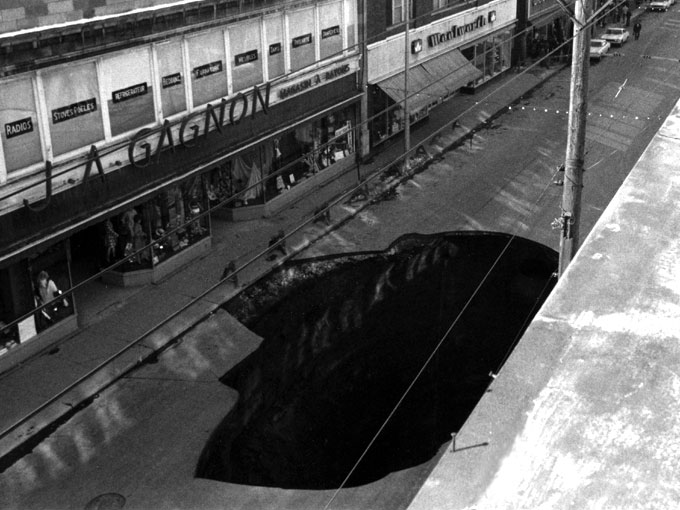 The sinkhole left in Rue Wellington after the cave-in.