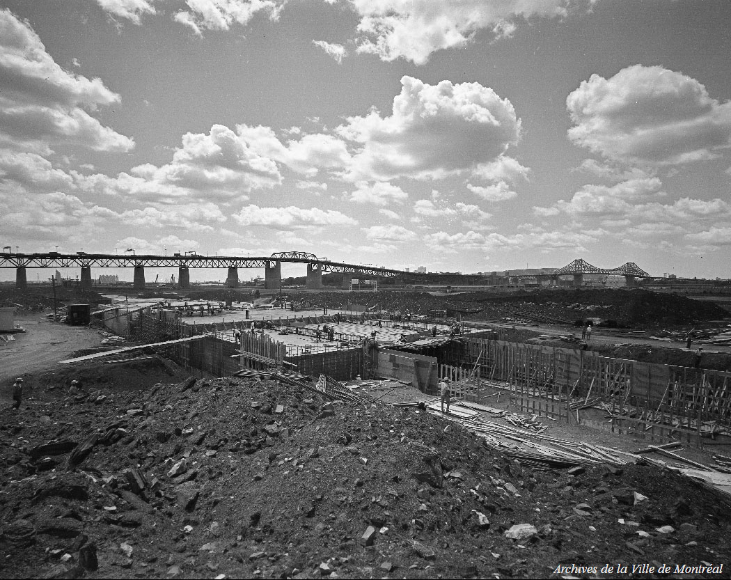 The station under construction, with the Jacques Cartier Bridge in the background, July 1966.