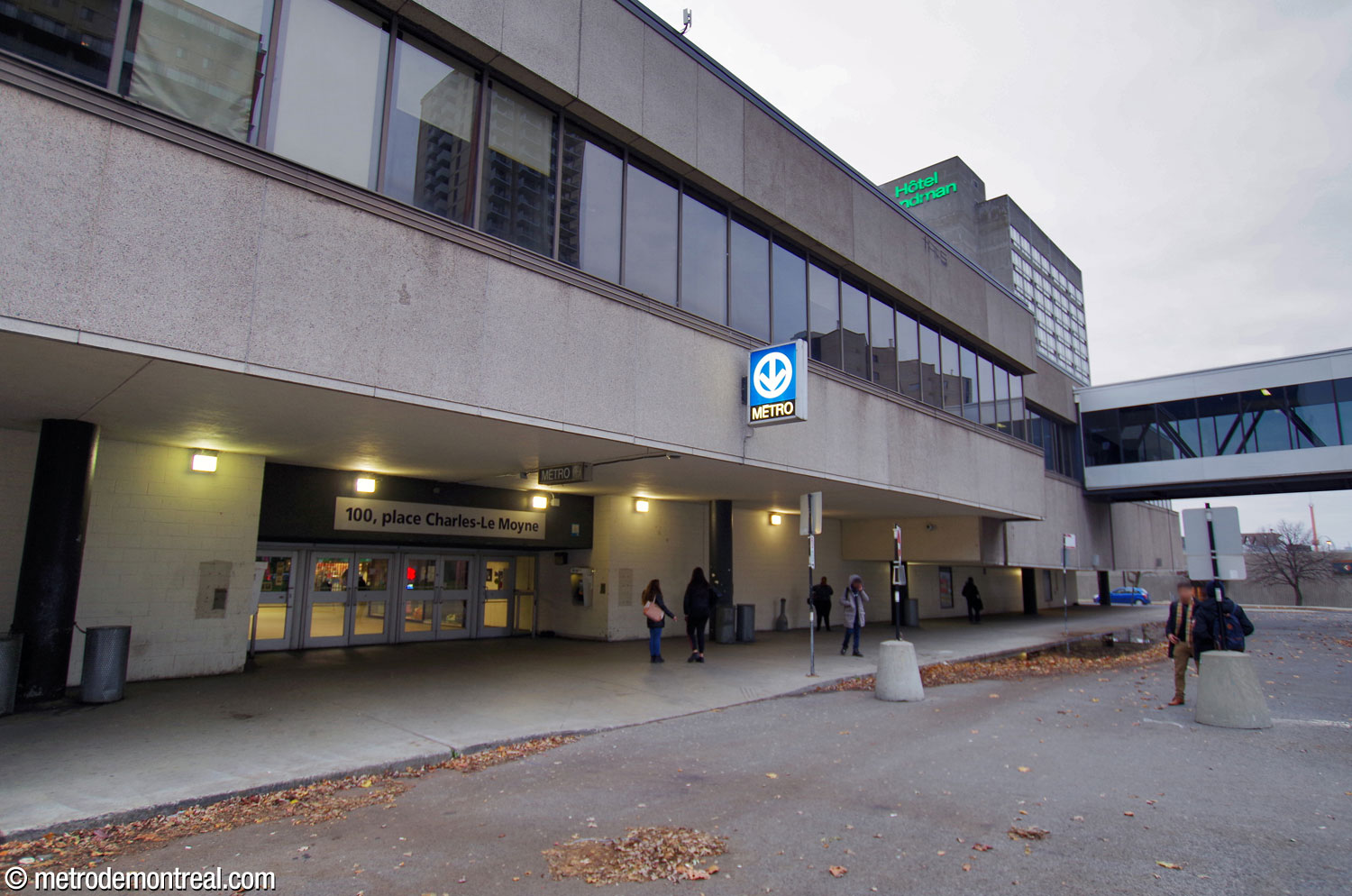 Complexe Charles-Le Moyne, the former shopping mall and office building into which the station's entrance was integrated, seen prior to its demolition starting in 2021.