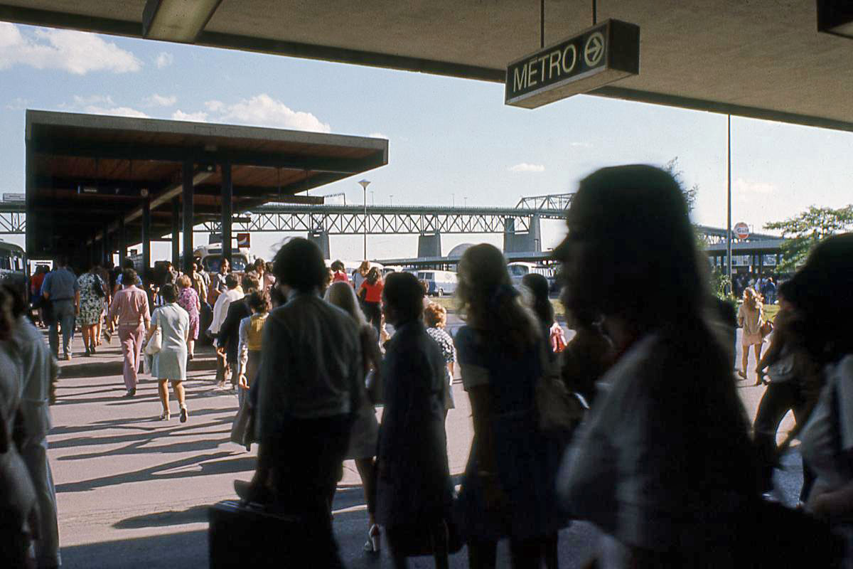 Passengers in the original bus terminal in the early 1970s.