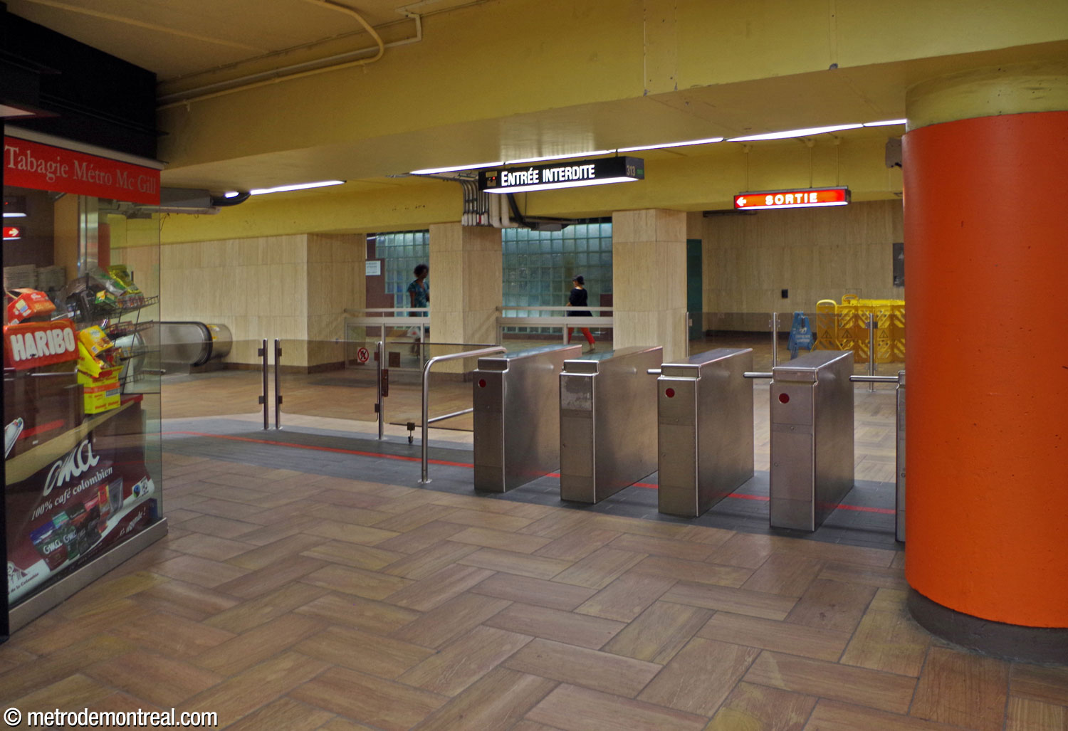 One of the two banks of exit-only turnstiles, at the head of the staircases exiting from the platforms onto the central concourse.