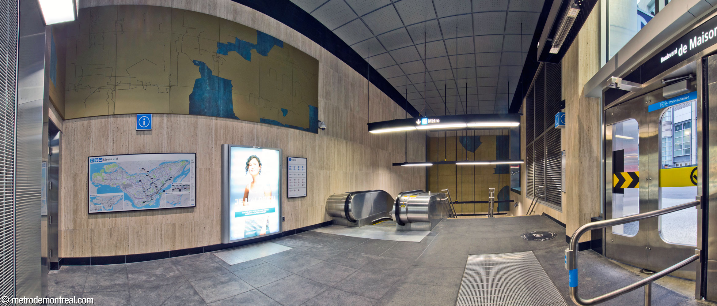 The interior of the McGill College entrance, featuring the two main sections of the artwork Vestiges by Mathieu Lévesque. The exit features an interior link to 1981 McGill College (far left).