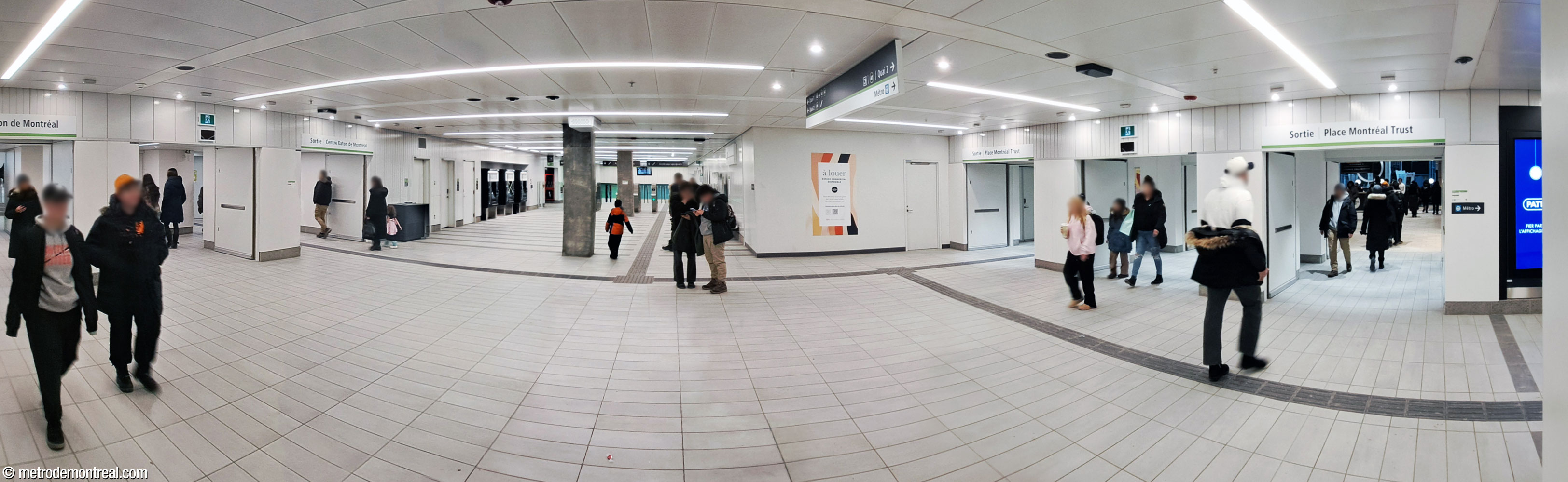 Panorama of the south ticket hall, which incorporated the existing underground city passage between the Eaton Centre (left) and Place Montréal Trust (right). At centre-left, the ticket hall extends south from the passage toward the gateline.