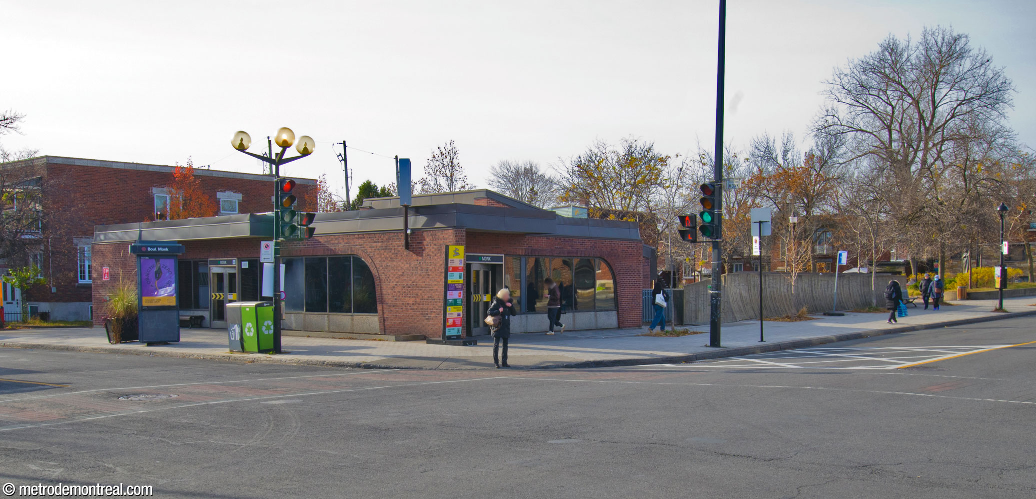 The Monk Sud headhouse seen from across the intersection. The low, long concrete structure at right is the light shaft illuminating the main volume.