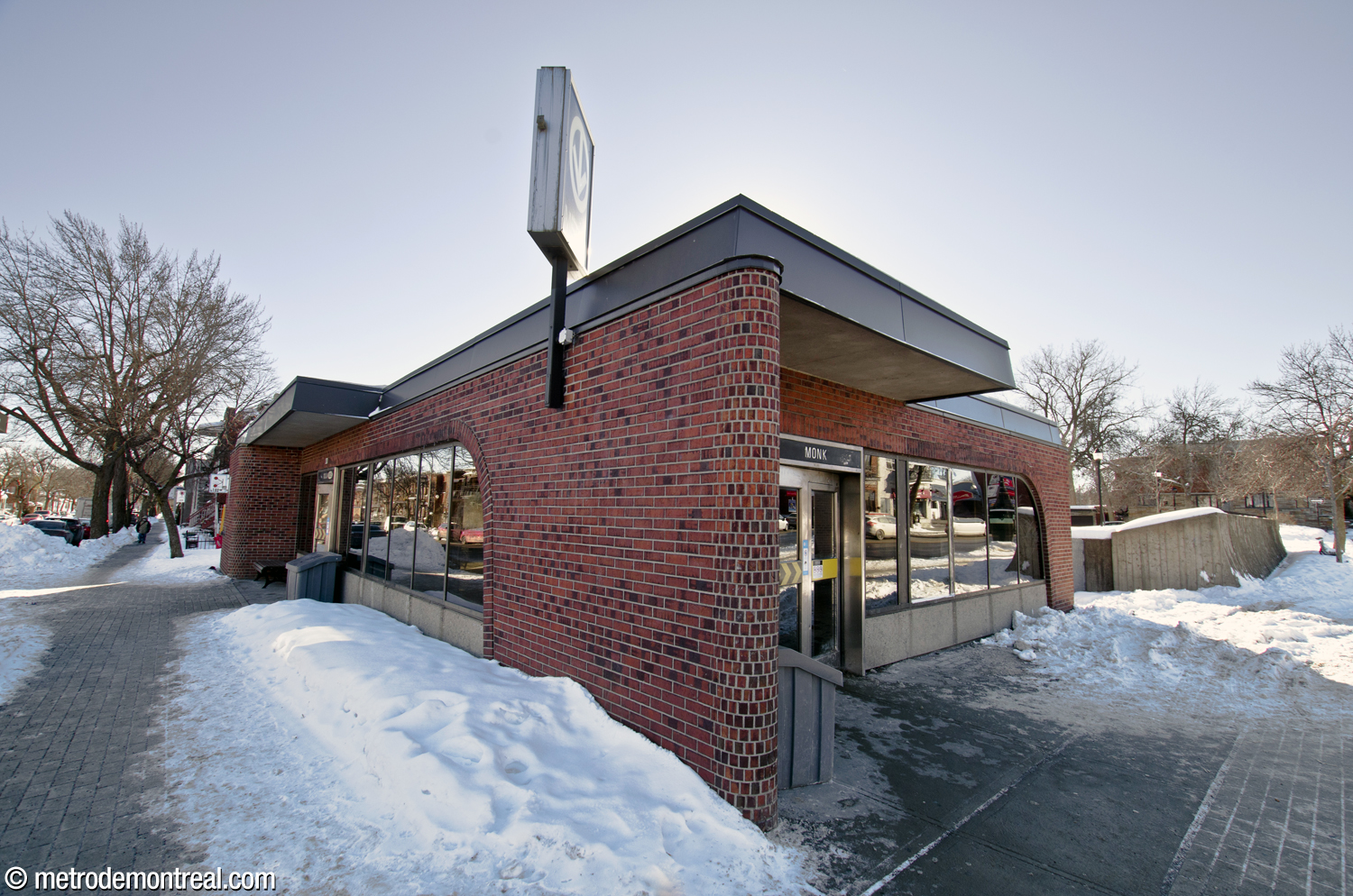Oblique exterior view of the Monk Sud headhouse, seen from the intersection.