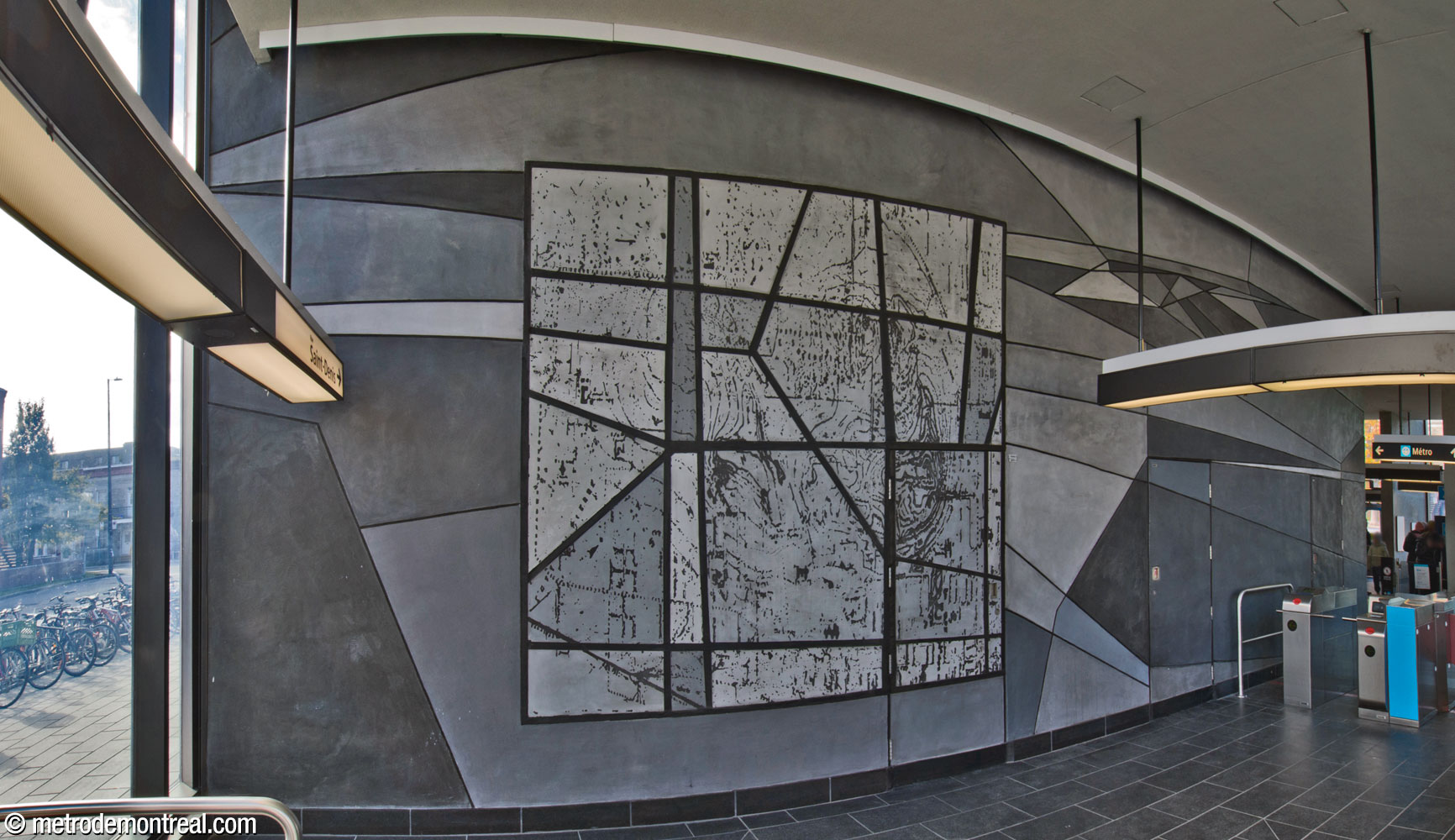 A section of Simon Bilodeau's mural Je reviens chez nous, on an east-facing wall in the rear of the headhouse, near the secondary entrance. The inset depicts the topography of Mount Royal.