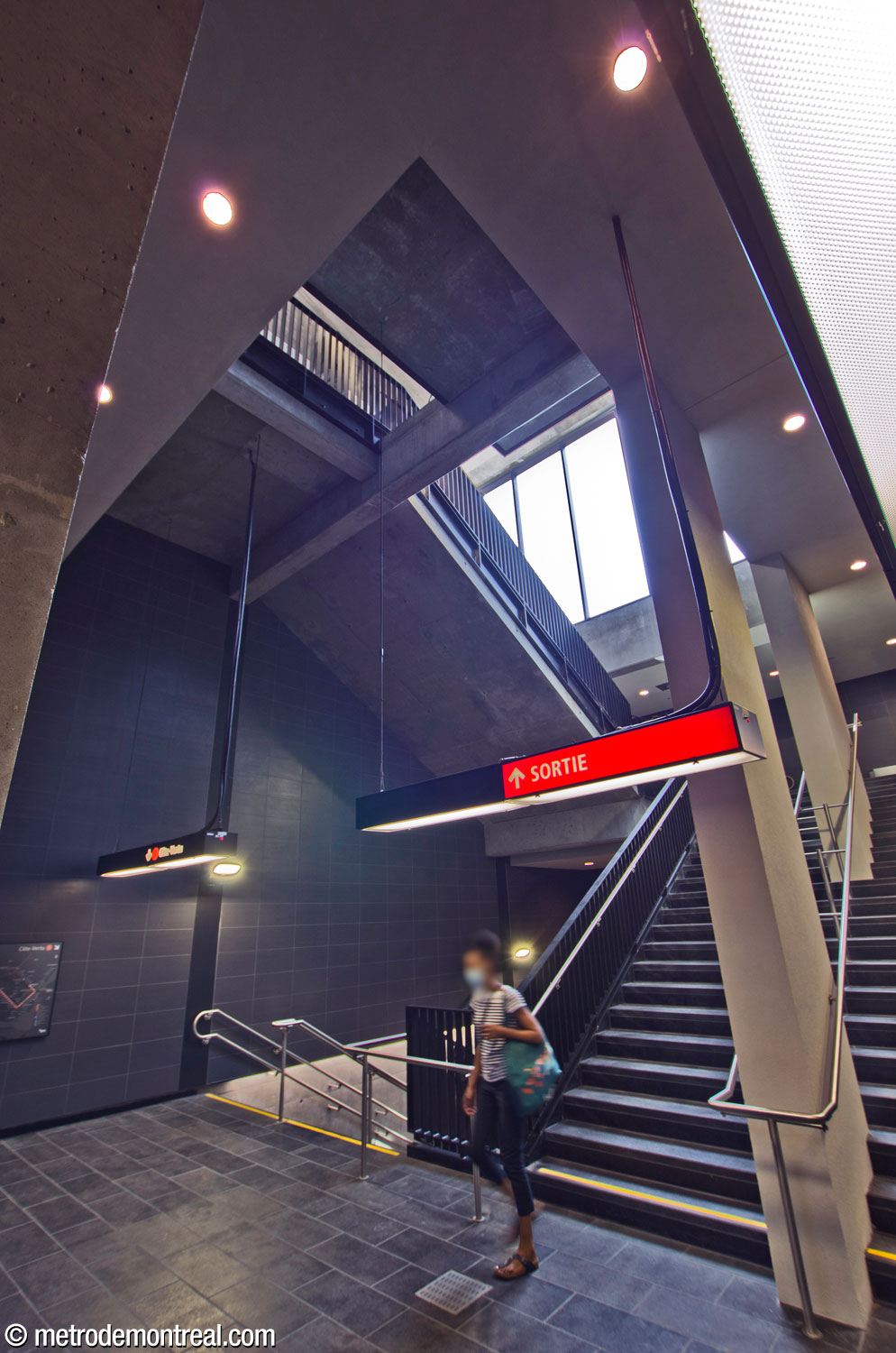 The stairwell descending from the headhouse to the new crossover and the Côte-Vertu platform.