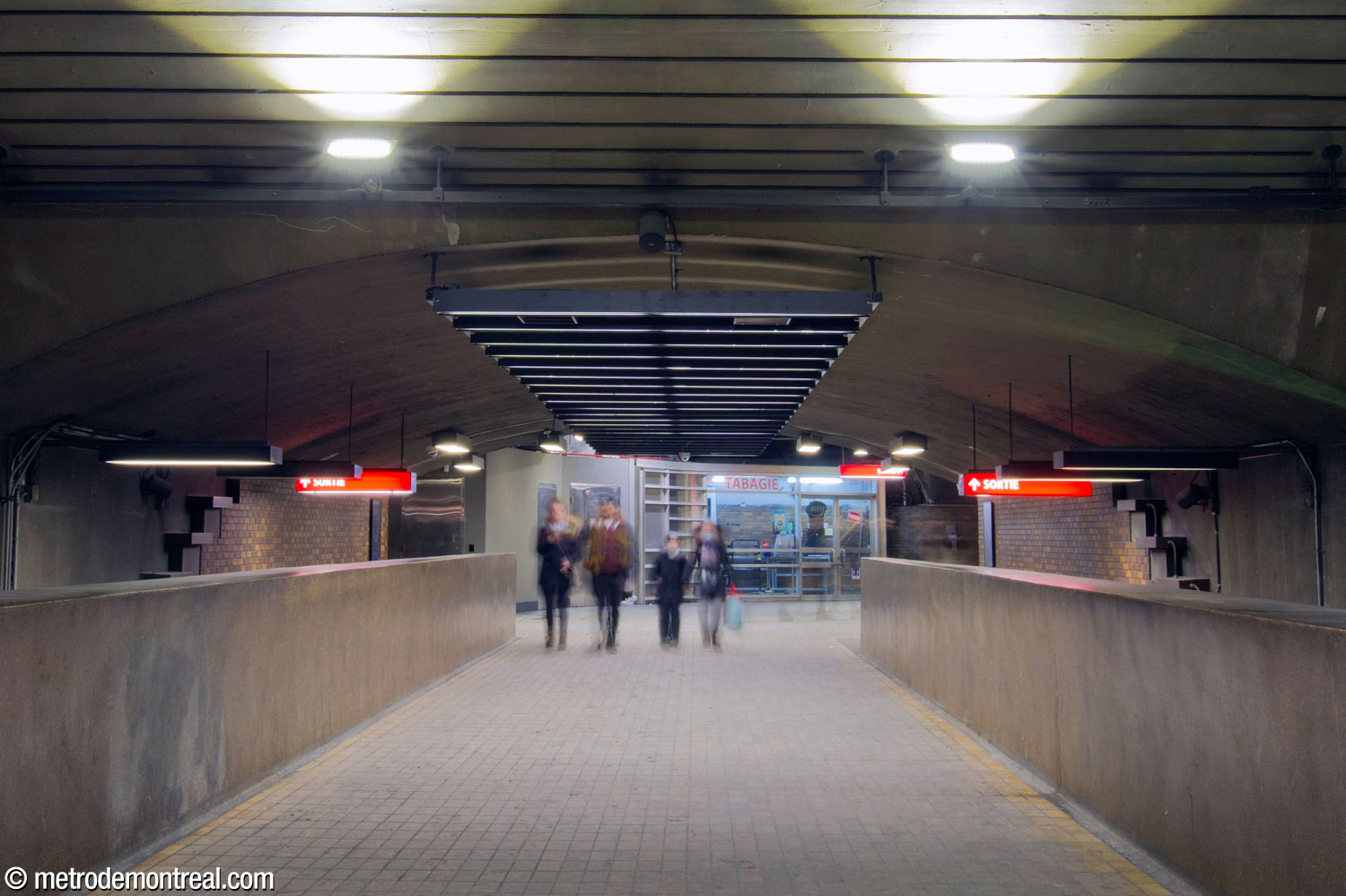 The area between the foot of the original access stairs and the transept, formerly occupied by the station's gateline.