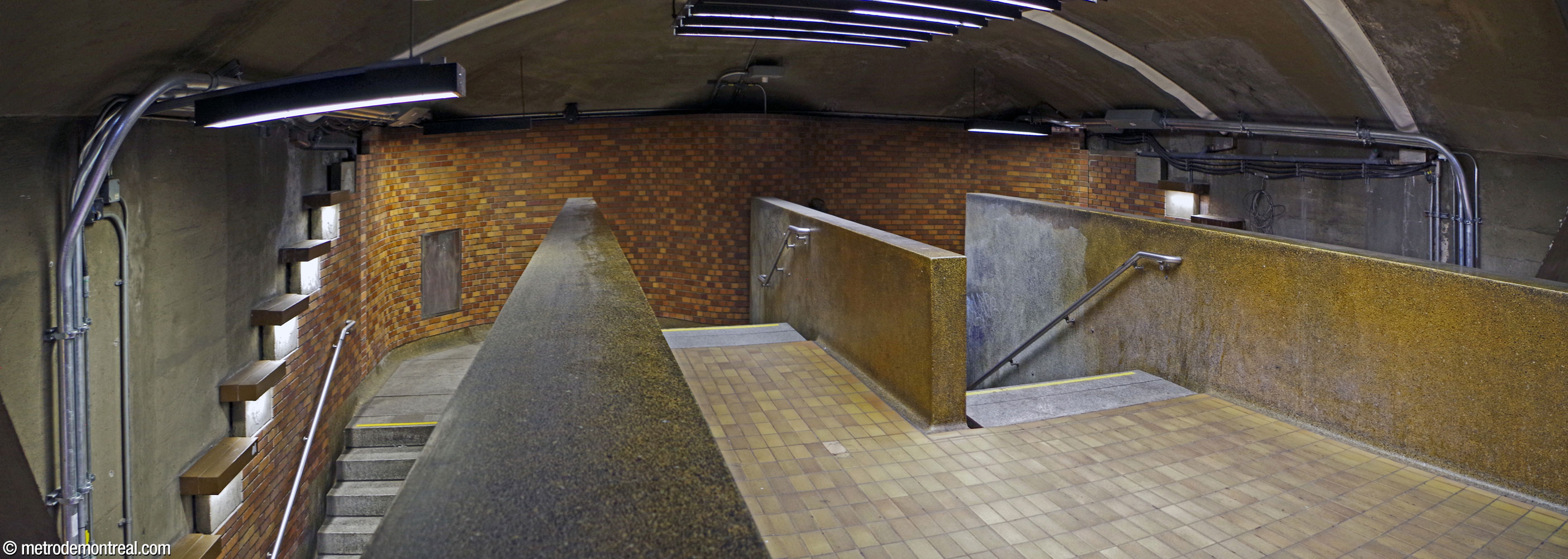 The staircases leading down from the original crossover to the Montmorency platform. For unclear reasons, the two stairs are separated and offset from each other.