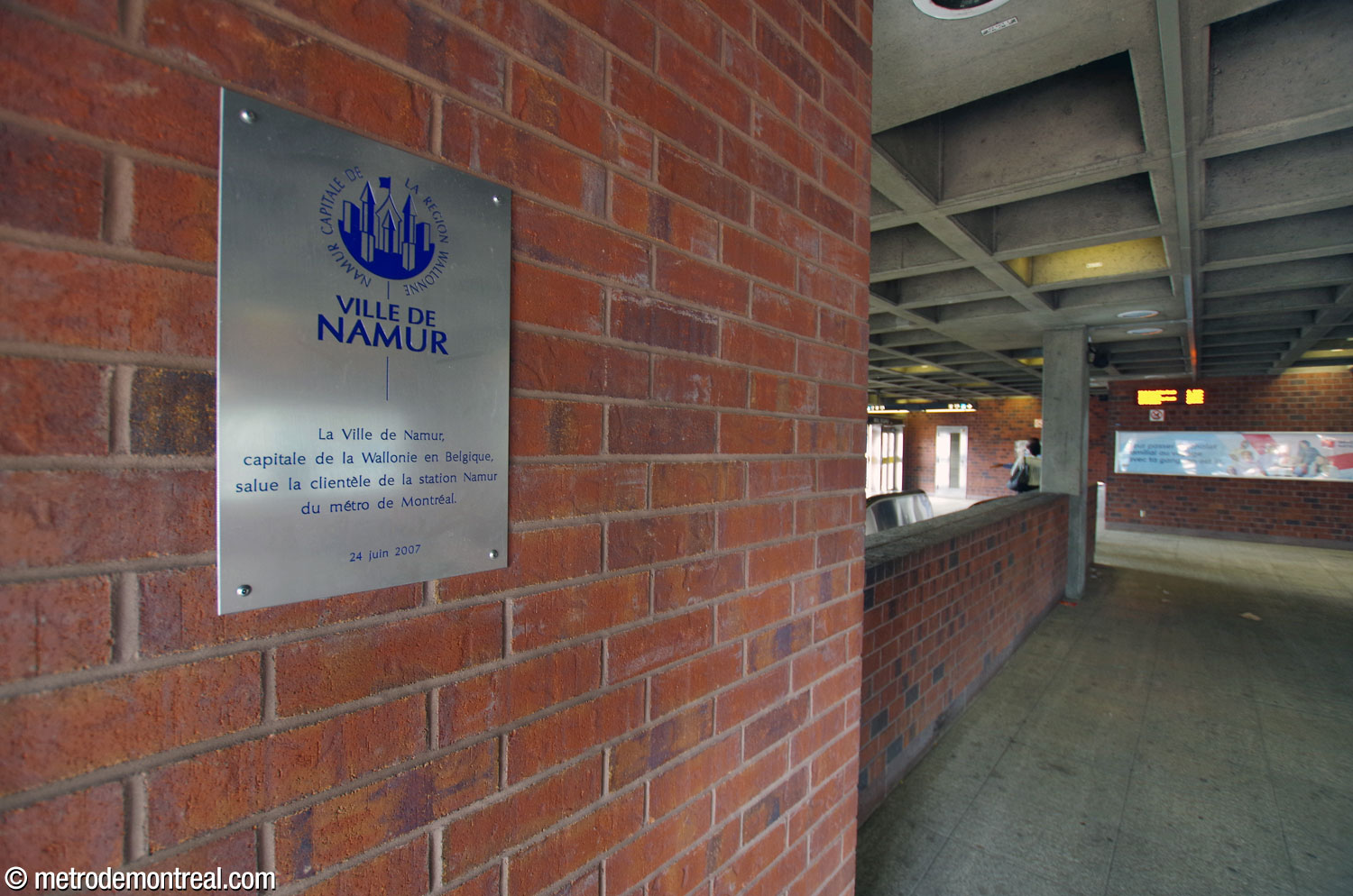 Commemorative plaque in the headhouse, presented by the City of Namur in 2007.