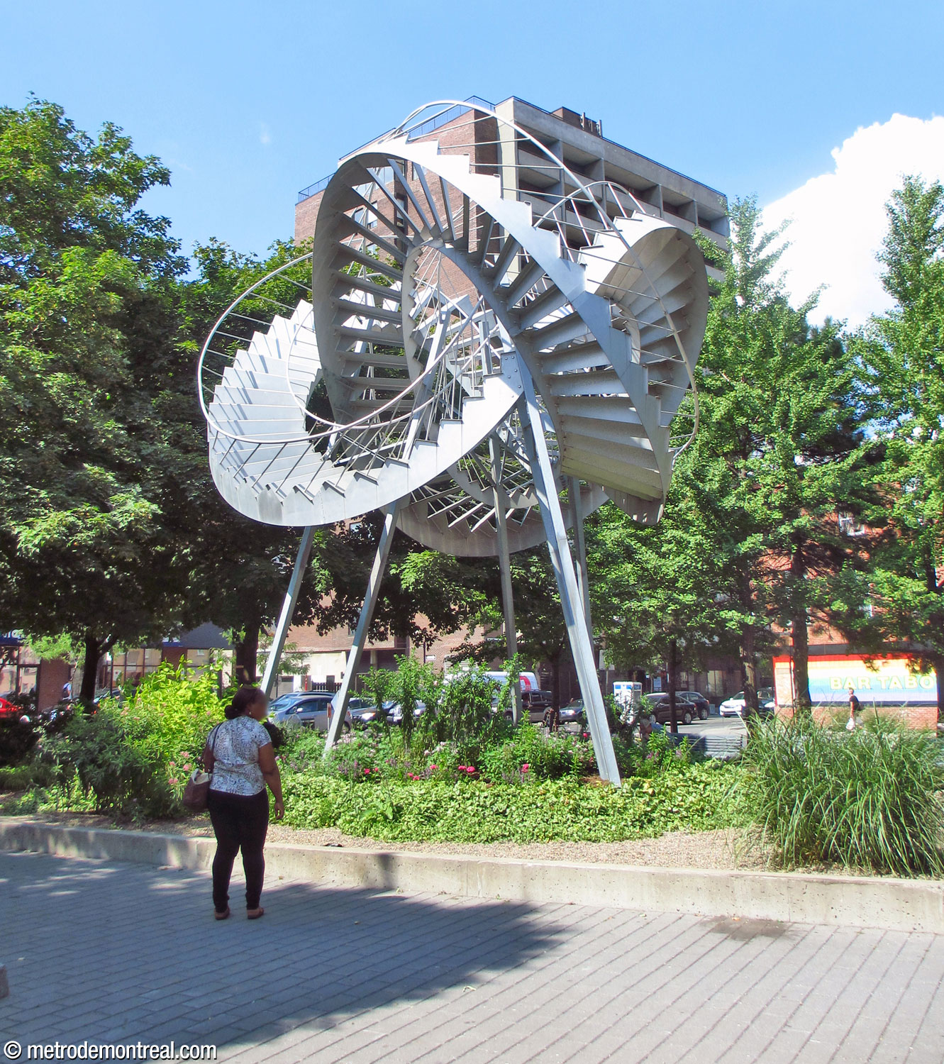 The sculpture Révolutions by Michel de Broin is located in a garden behind the station's headhouse.