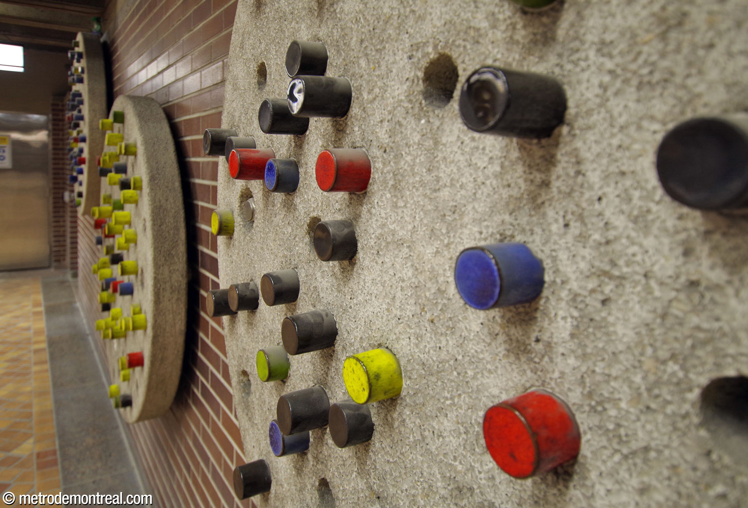 Detail of Marcel Raby's mural sculpture at the ticket hall level.