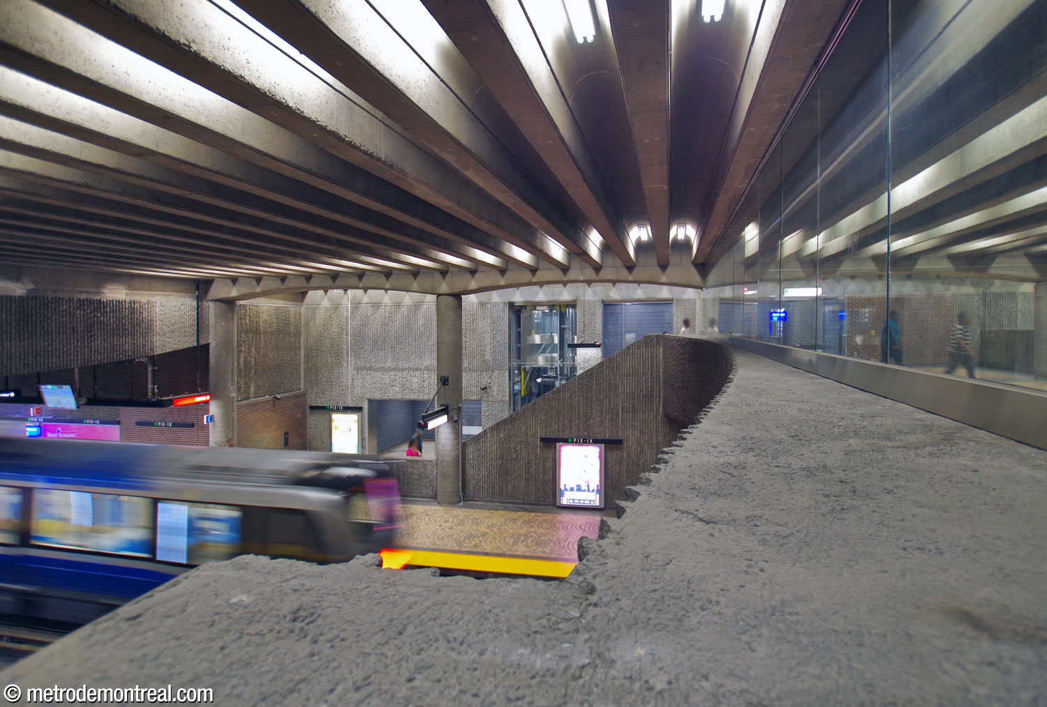 The inwardly curved outer surface of the parapet overlooking the eastern end of the trainroom. Glass was added for fire safety in 2020-22.