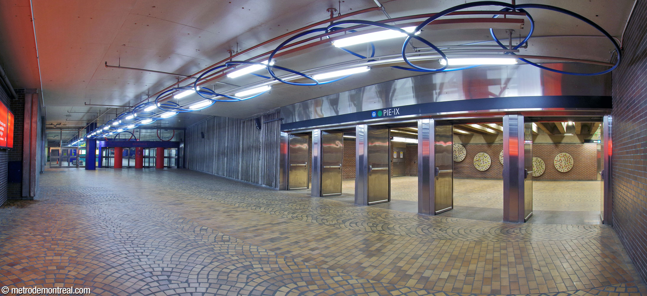 Interior of the underground city access to the stadium. Note the fan-shaped floor tile patterns, shared with the station.