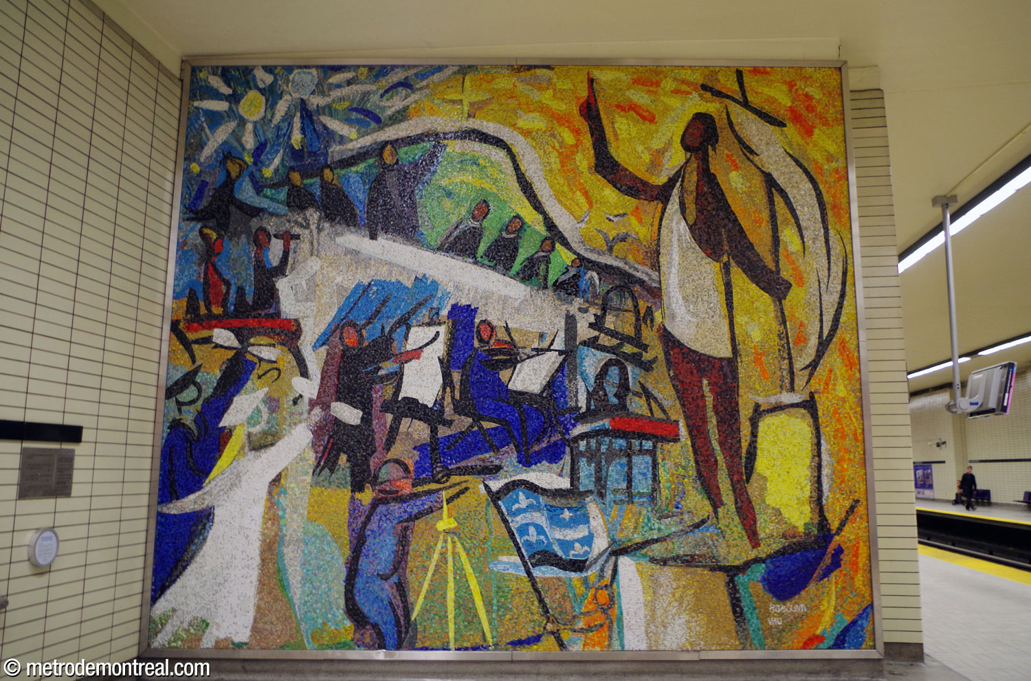 The large, colourful mosaic by Gabriel Bastien and Andrea Vau commemorating the Société Saint-Jean-Baptiste, on the Côte-Vertu platform.