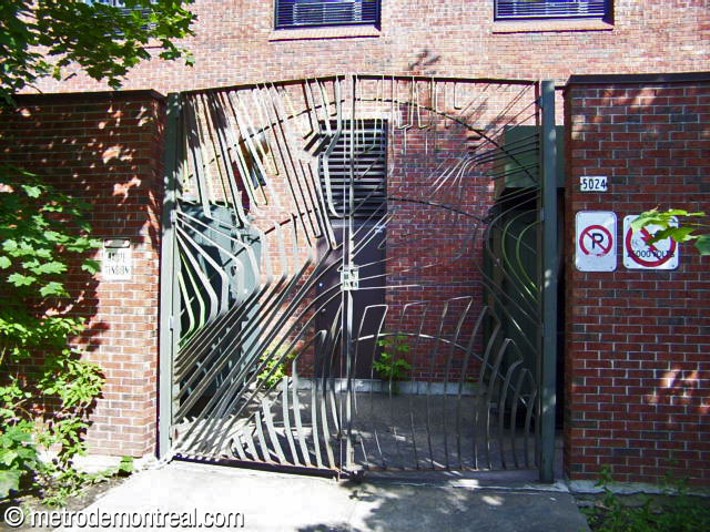 The sculptural gates by Jean-Louis Beaulieu on the rear of the station, prior to their removal and reinstallation inside