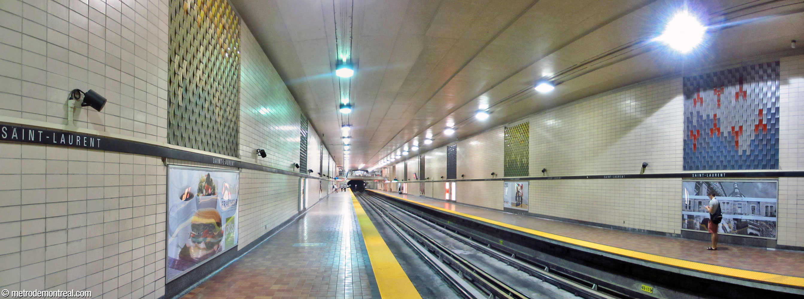 Panorama of the trainroom from the eastern end of the Honoré-Beaugrand platform, showing the murals by Claude Vermette.