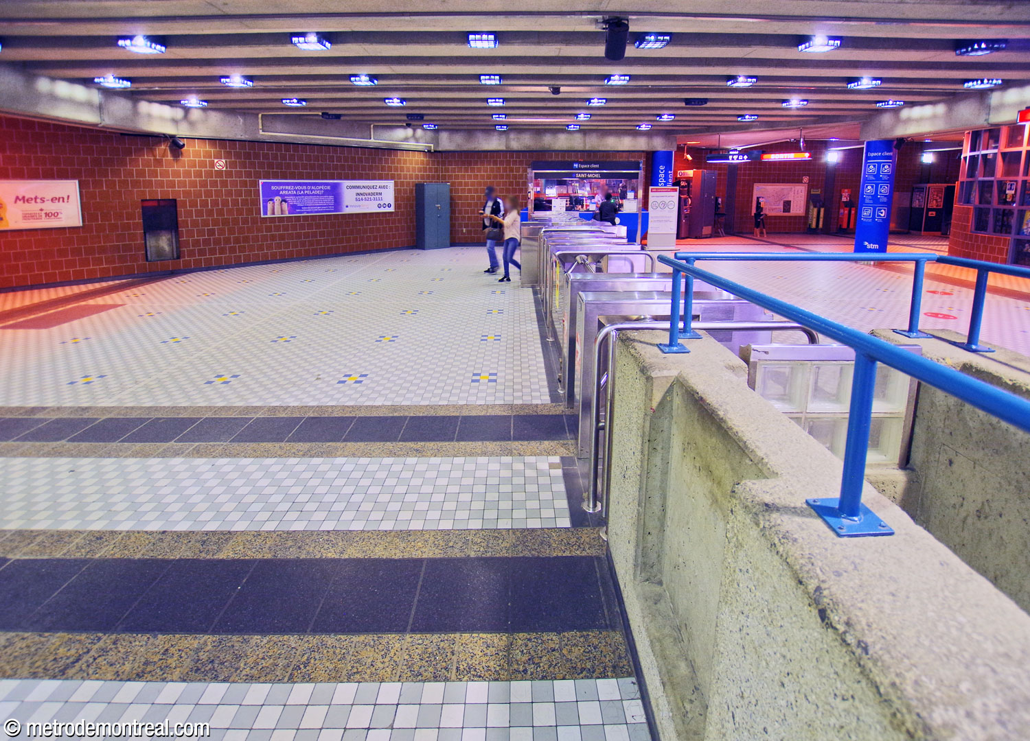 The ticket hall, looking south along the gateline. In the right background is the hallway to the west headhouse.