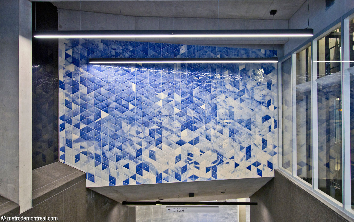 The second segment of Patrick Bernatchez's mural cycle, located above the stairs connecting the new headhouse to the commuter train station and pedestrian tunnel to the MUHC.