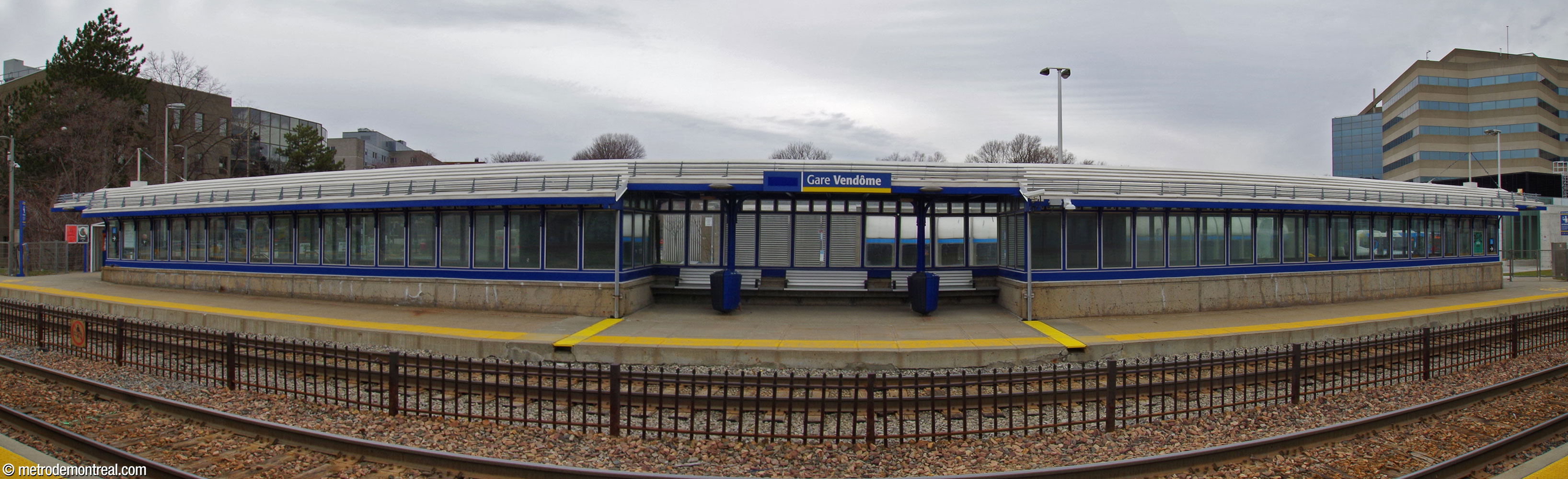 A more recent headhouse on the south train station platform, with blue mullions.