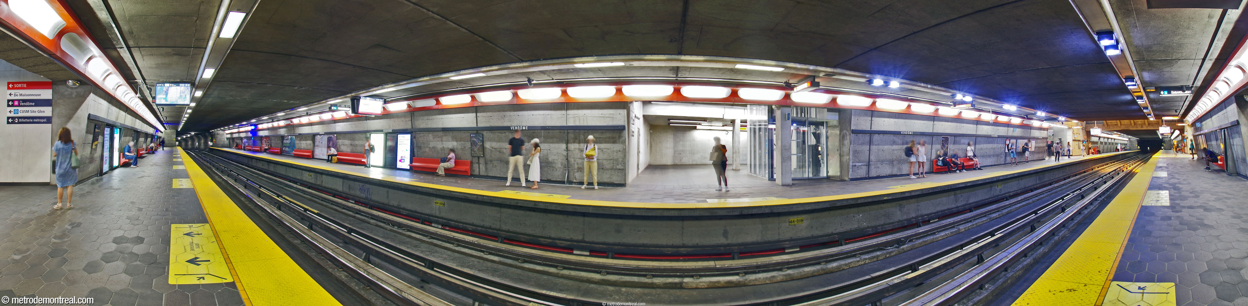 Panorama of the trainroom, seen from the Côte-Vertu platform, facing the stairwell and elevator from the Montmorency platform to the new headhouse. The access to the original headhouse is at right.