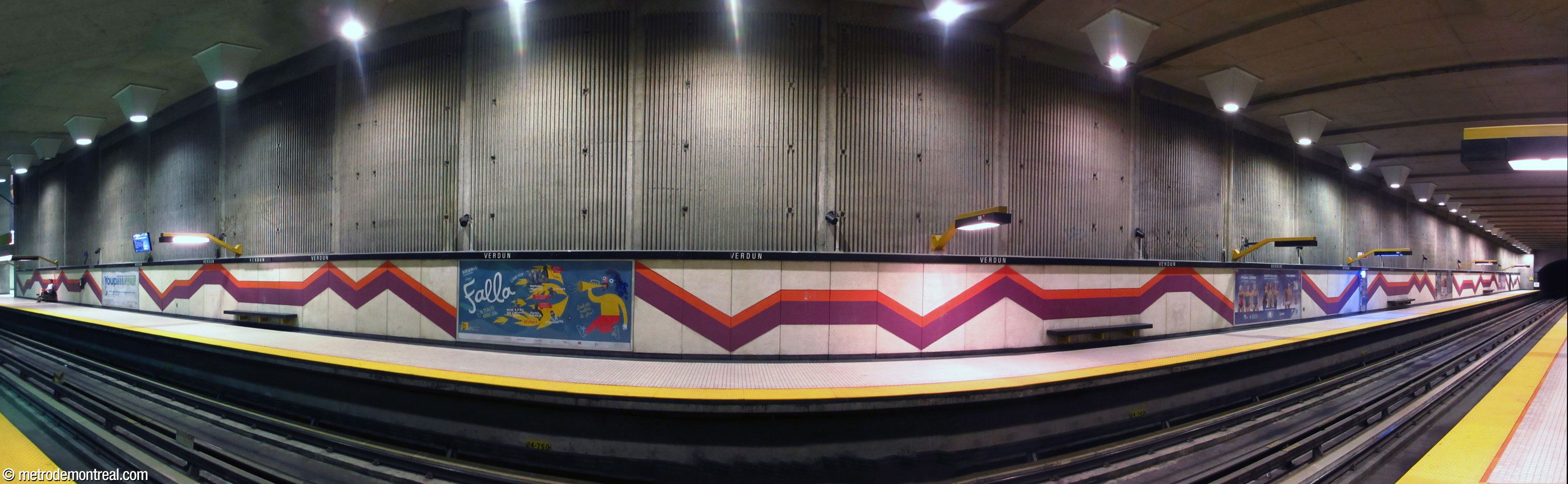 Panorama of the Honoré-Beaugrand platform showing the murals along the platform length.