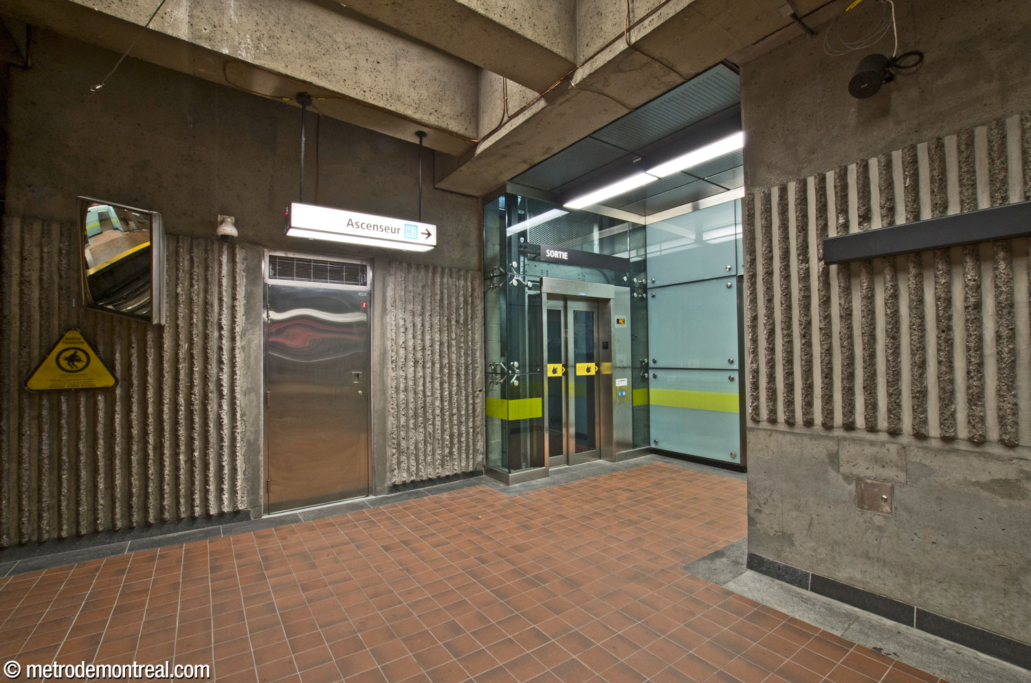 The foot of one of the elevators, at the far eastern end of the platform.