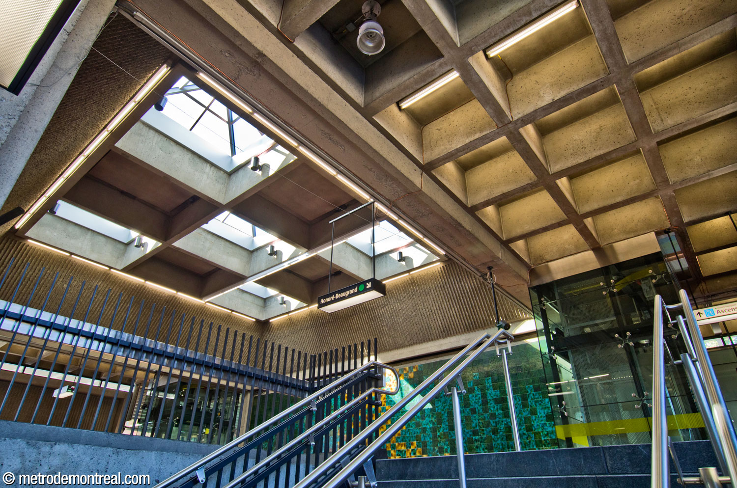 The roof of the headhouse, seen here from one of the stairwells to the Honoré-Beaugrand platform, features three arrays of skylights in a checkerboard pattern.