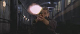 Declan Mulqueen (Richard Gere) shoots at the Jackal (Bruce Willis) in a metro tunnel in The Jackal