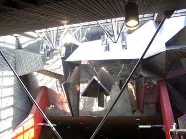 Stainless steel mural sculpture by Peter Gnass