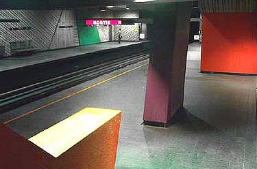 Sculptured wall forms in a stairway from the Angrignon platform