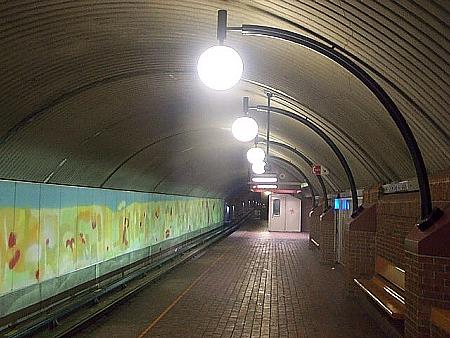 Vaulted ceiling of blue-line terminus platform, with mural by Claude Guité