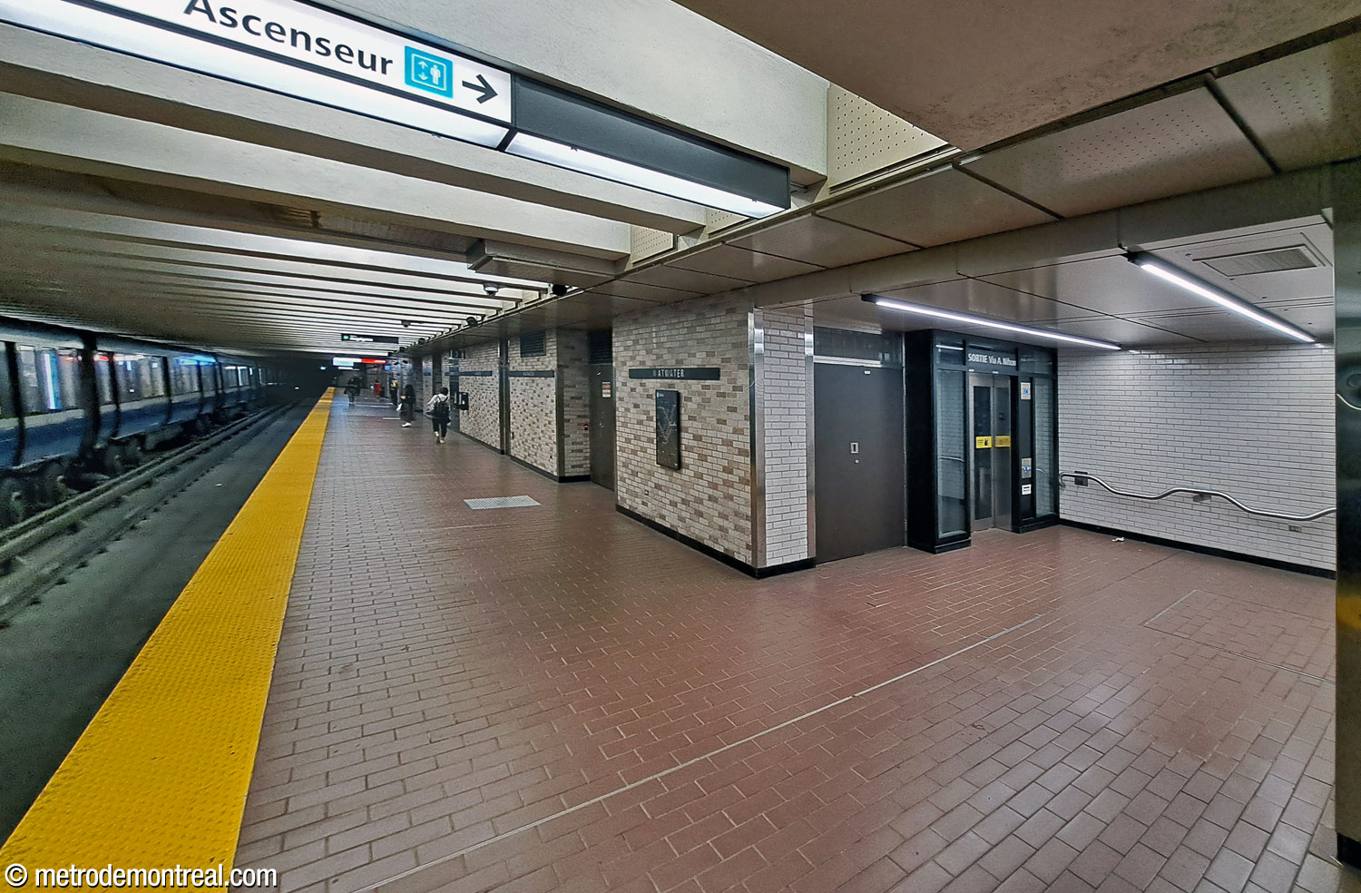 The white-brick-clad alcove containing one of the elevators at platform level, this one on the Angrignon platform.