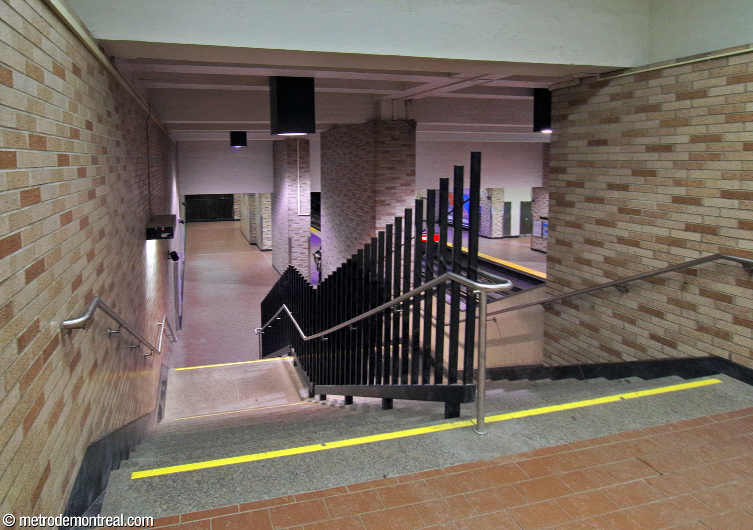 One of the staircases from the ticket hall to the platform. Unusually, the stations' platform staircases have grilles in the centre.
