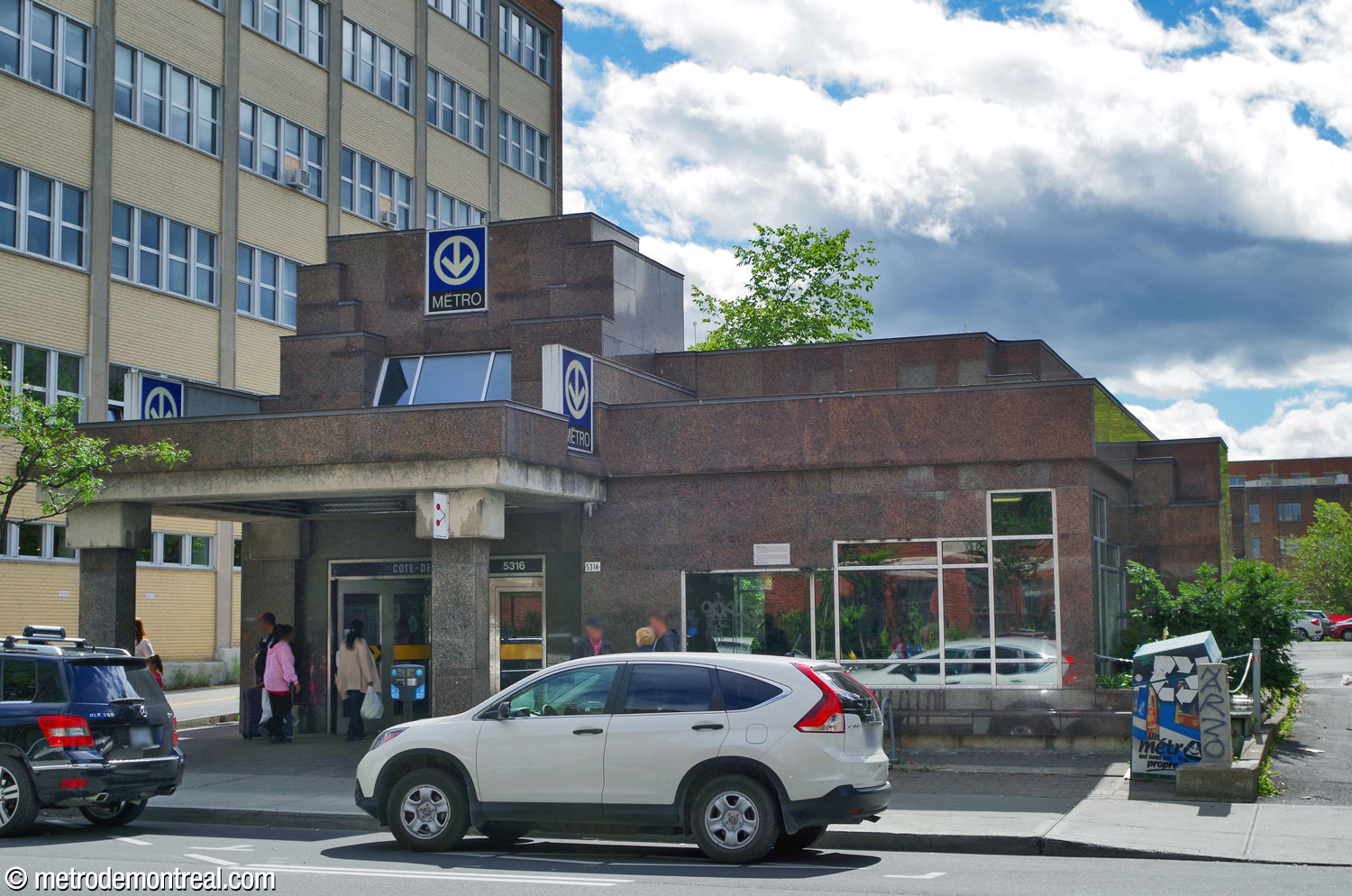 Exterior of the imposing Côte-des-Neiges Ouest headhouse, whose blocky forms suggest the mausoleums of the nearby Notre-Dame-des-Neiges cemetery.