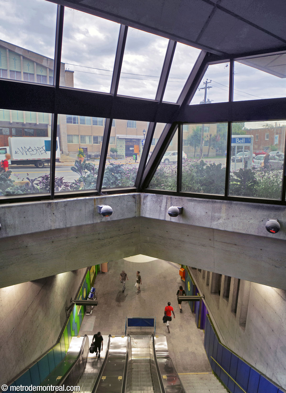 Looking down into the volume of the escalator well and east ticket hall from the bridge in the headhouse.