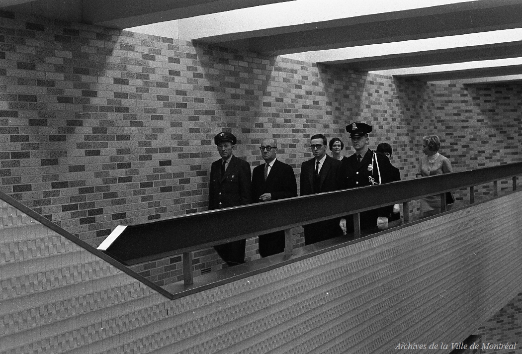 Dignitaries arrive at the station during its inauguration, October 14, 1966. At the bottom, the station's original textured ceramic tiles can be seen.